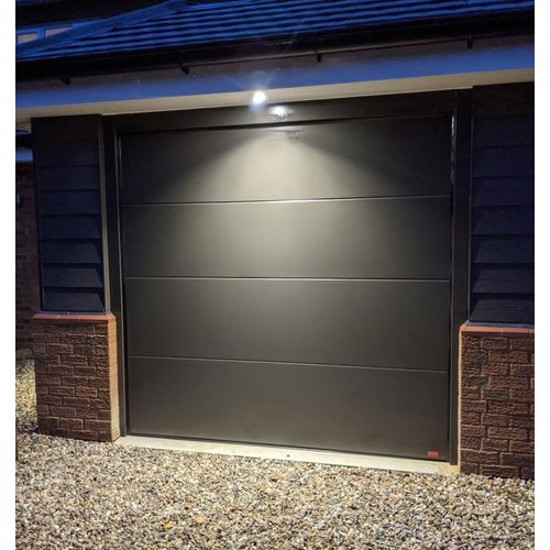 Birkdale Premium Grey Sectional Garage Door night shot